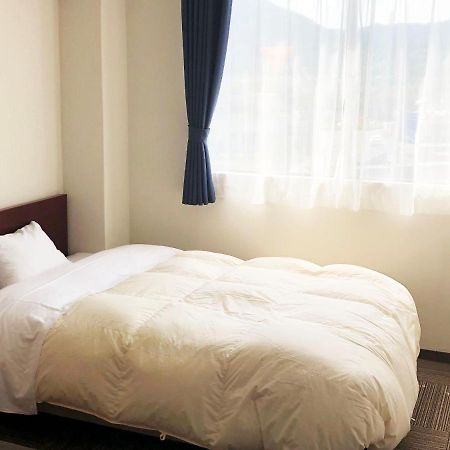 Business Hotel Fujimi Фудзиёсида Экстерьер фото