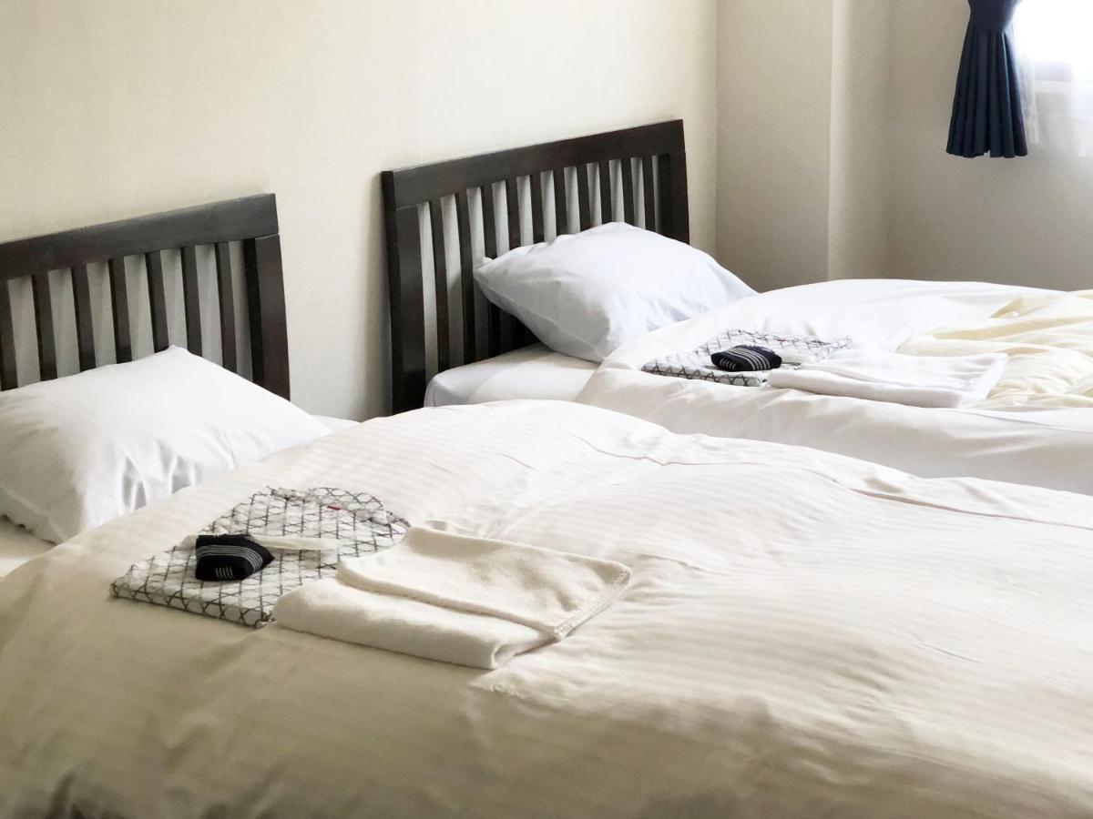 Business Hotel Fujimi Фудзиёсида Экстерьер фото